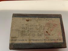 TWO ORIGINAL TINS CONTAINING