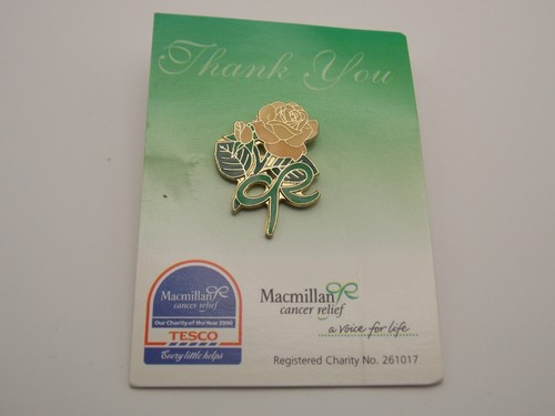 Macmillan cancer relief pin - relief,