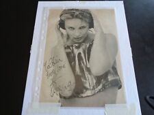 KYLIE MINOGUE AUTOGRAPH /SIGNED MAGAZINE PAGE.... A GREAT VINTAGE SIGNATURE