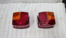 TWO NEW OLD STOCK ORIGINAL CASE INTERNATIONAL TRACTOR XL CAB TAIL LIGHTS 585-885