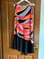 Ronni Nicole dress size M oranges black pinks