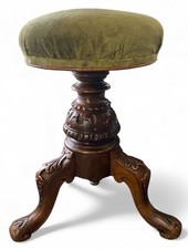 Victorian 3 Leg Carved Revolving Piano Stool With Green Upholstered Seat.