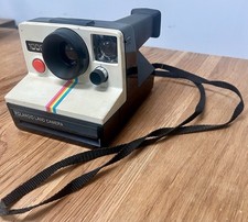 Vintage 1977 Polaroid 1000 Land Camera with 2 flash bars (each 7 left) Untested