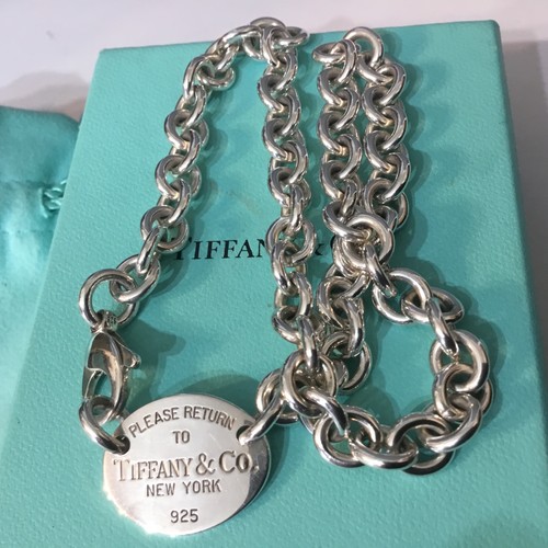 Return tiffany co - &, oval