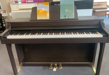 Roland HP204 digital piano great condition inc warranty + professional delivery