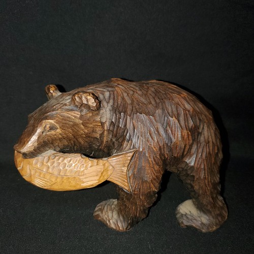 Wooden bear and salmon - and,
