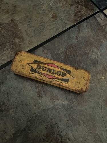Old dunlop tin - old,