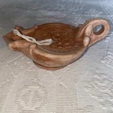 replica Roman terracotta oil lamp. 