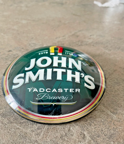 John smiths round badge - john,