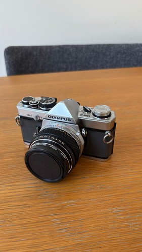Olympus with mm - om-2, f1.8