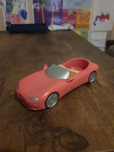 Barbie pink convertible car - pink,