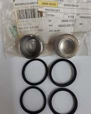 GENUINE SUZUKI FRONT BRAKE CALIPER PISTON AND SEAL KIT, AY50 KATANA UX50 ZILLION