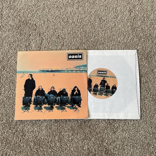 Oasis roll with it s - –,