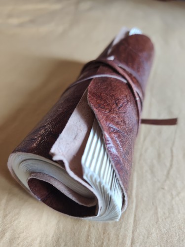 Leather scroll diary rolled - rolled, up