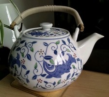 Vintage Oriental style Tea pot with lid, decorative, wrapped wood handle.