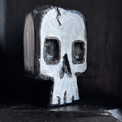 Handmade carved skull totem - carved,