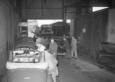Morris Minor packed for export