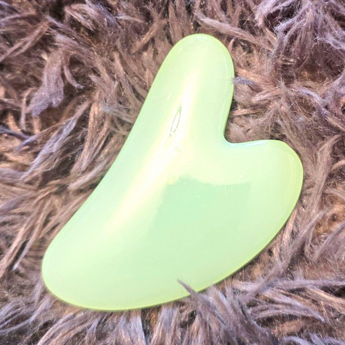 Green stone gua sha - sha, massage