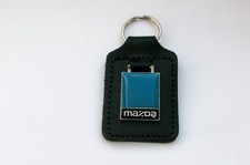 MAZDA ENAMEL AND LEATHER