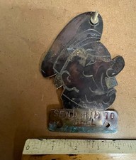 WW2 soldier made car badge comical Hitler portrait in brass trench art type item