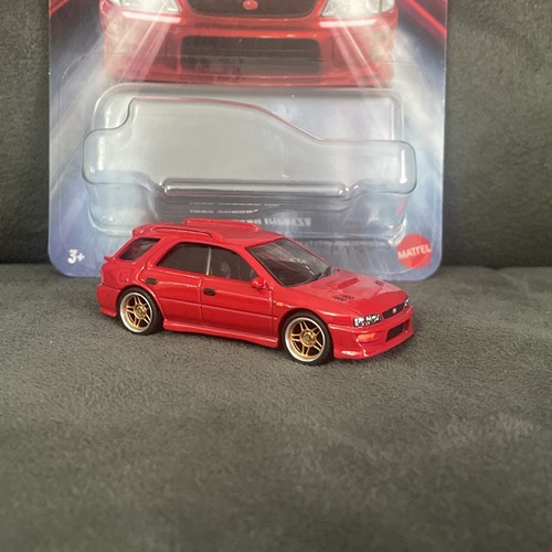 Hot wheels red subaru - ‘99,