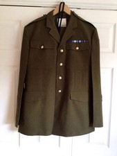 British Army Officers Service Dress Uniform complete with  badges and ribbon.