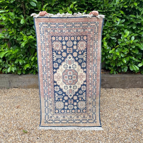 Middle eastern wool rug small - middle,