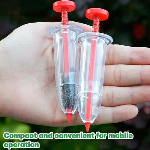 Hand held seed - held,