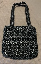 Women’s shoulder bag, ring pull and crochet. 