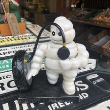 Michelin Man Inflating Tyre