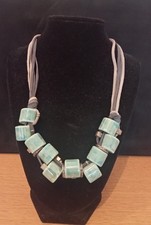 ONE BUTTON NECKLACE ON SUEDE