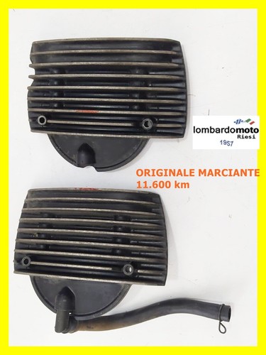 Pair covers lid - of, head