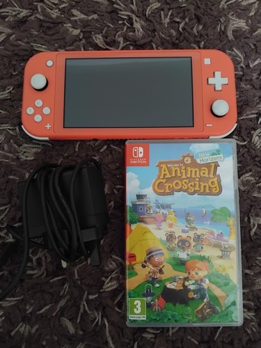 Nintendo switch lite coral - nintendo,