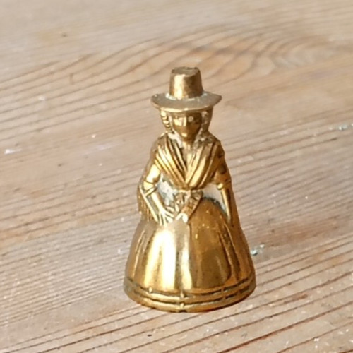 Small brass lady - bell, welsh