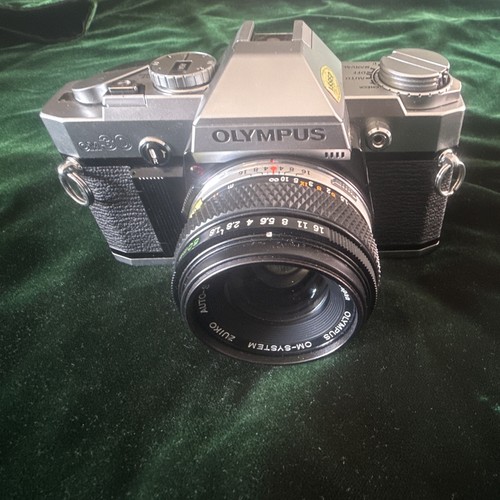Olympus silver 35mm slr - om-30,