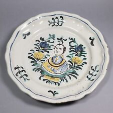 An 18th Or 19th Century Tin Glazed Pottery Plate Depicting A King?