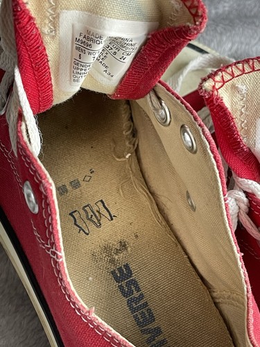 Heavily worn red converse - worn,