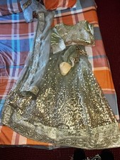 Green Full Length Lengha Party Wear With a Bag.