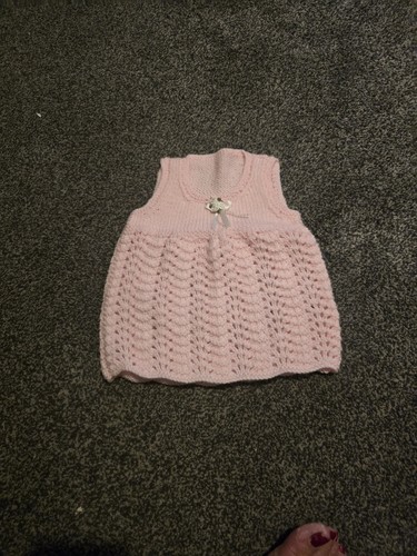Hand knitted newborn baby - hand,