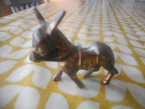 Small brass donkey.