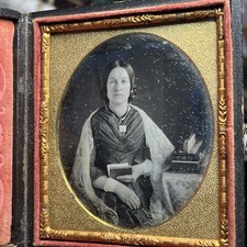 pleasant woman with a book and flutina/accordian