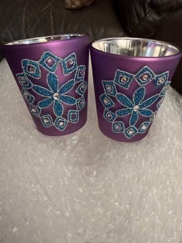 Highly decorated votive - x,