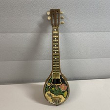 Vintage Wind Up Greek Carved