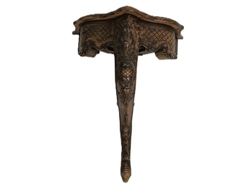 Ornate carved wooden console