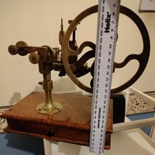 Antique watchmaker's hand-cranked rounding up topping tool with draw of cutters 