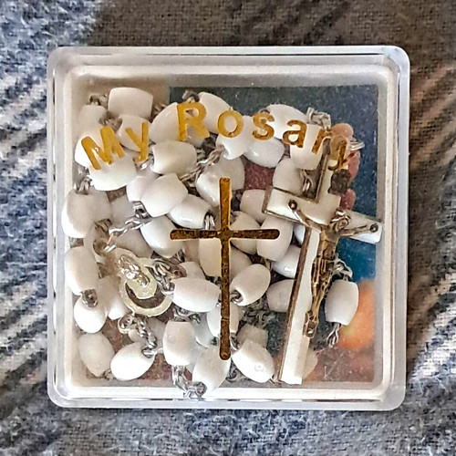 White plastic rosary with
