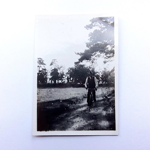 Antique bicycle rider photo