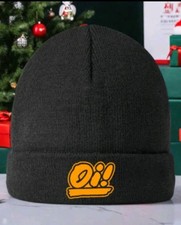 Unisex Black 'Oi!' Beenie with An Orange  Emblem On The Front. One Size Fits All