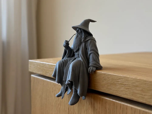 Gandalf sitting shelf - on,