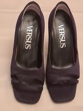 Black satin high - heel, versus